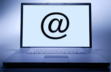 Contact us graphic - computer with @ sign. 